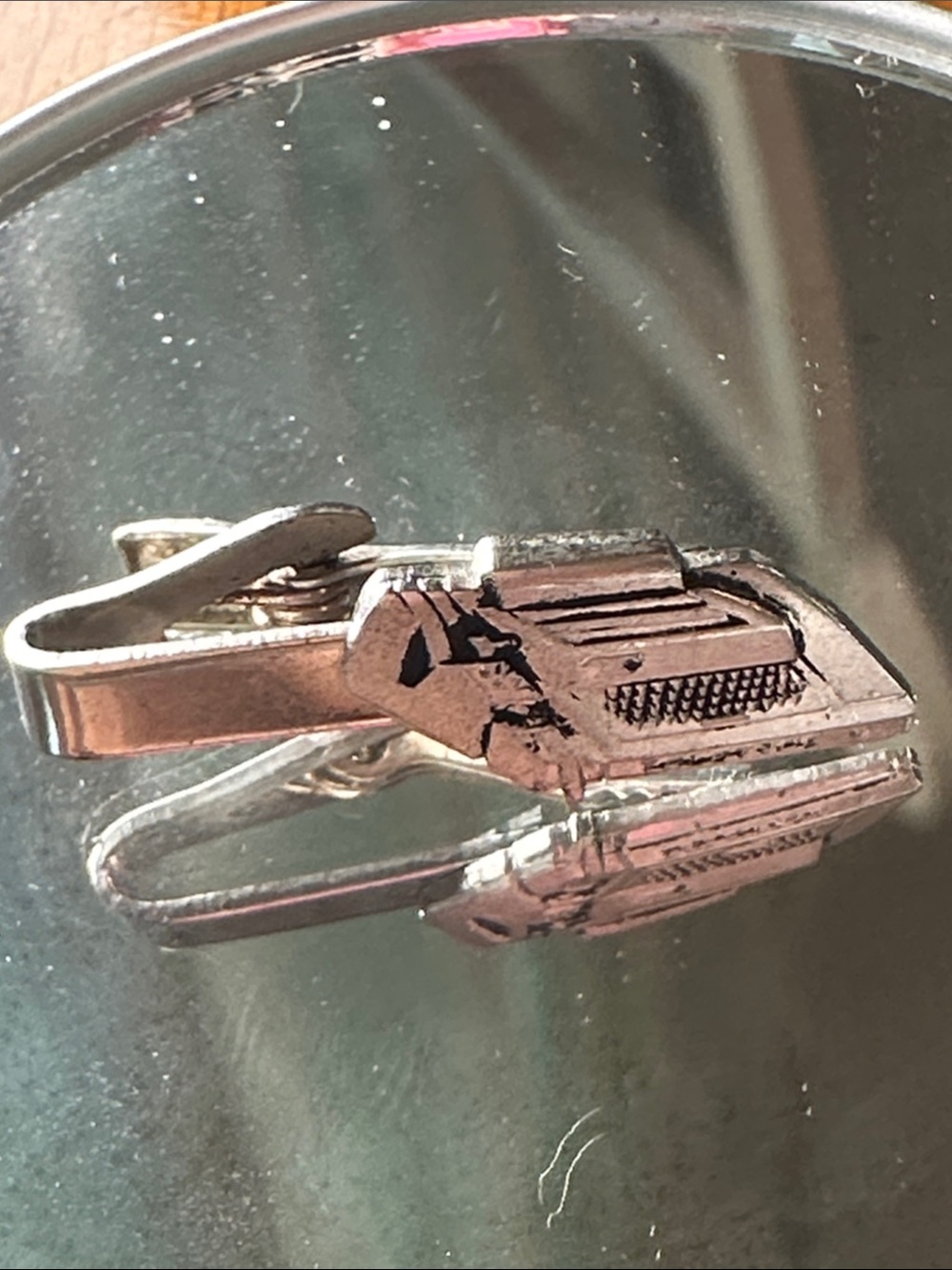 Vintage 60s Silver Tone Teletype tie clip manufactured by the Robbins Co.